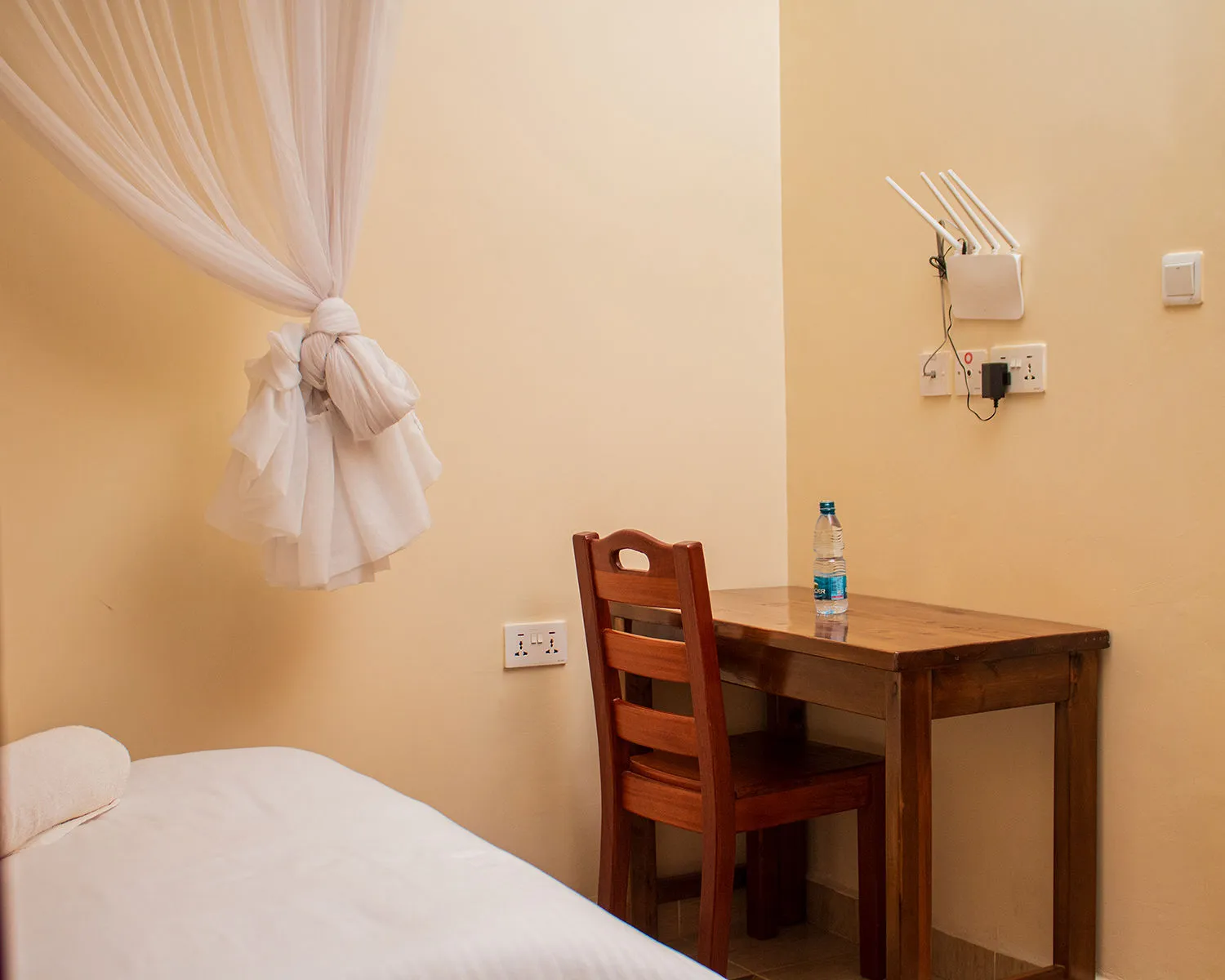 Standard single guest room at Amani Centre